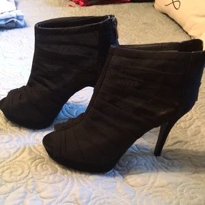 Classy black peep heels